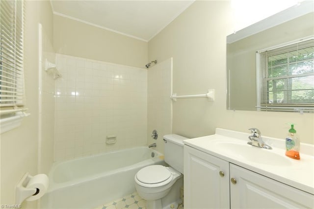 full bath with toilet, crown molding, vanity, and  shower combination