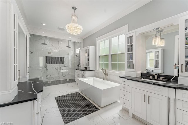 6323 Nesting Way, Oak Ridge, NC 27310 - bathroom featuring a marble finish shower, a wealth of natural light, recessed lighting, a notable chandelier, and marble finish floor