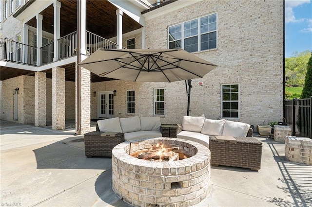 6323 Nesting Way, Oak Ridge, NC 27310 - view of patio / terrace with an outdoor living space with a fire pit