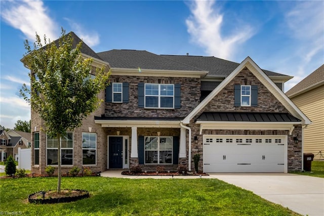 2110 Owls View Ln, Colfax, NC 27235 - craftsman-style home with concrete driveway, a front yard, a standing seam roof, and a shingled roof