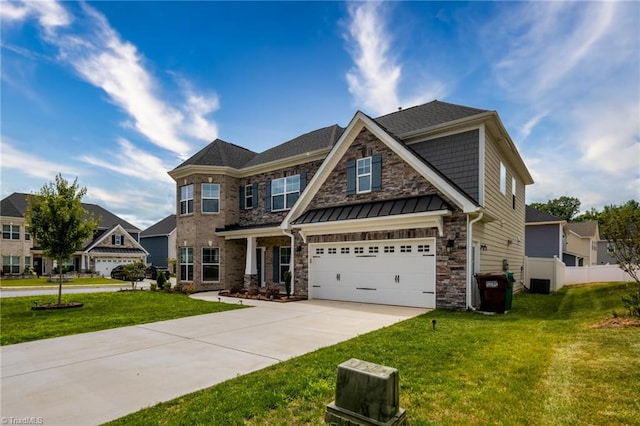 2110 Owls View Ln, Colfax, NC 27235 - craftsman-style house with concrete driveway, a standing seam roof, an attached garage, and stone siding