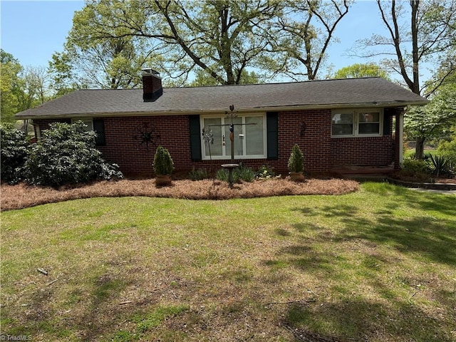 1632 Sanford Dr, Winston-Salem, NC 27105 - ranch-style home featuring brick siding, a front yard, and a chimney