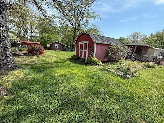 1632 Sanford Dr, Winston-Salem, NC 27105 - view of yard featuring a storage shed and an outdoor structure