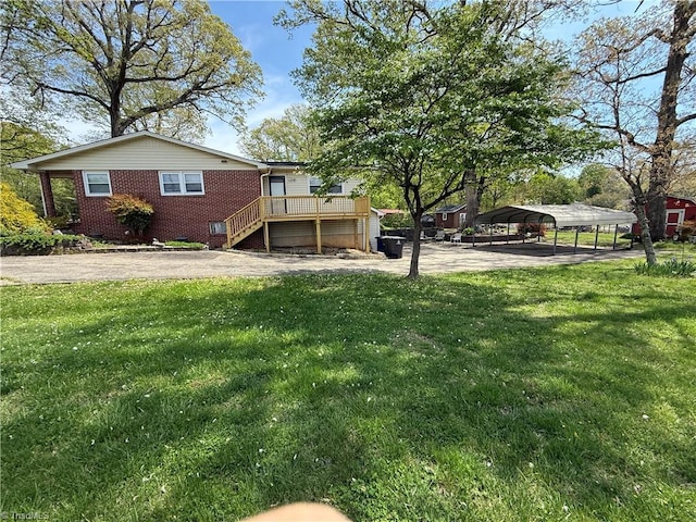 1632 Sanford Dr, Winston-Salem, NC 27105 - view of yard featuring a detached carport and aphalt driveway