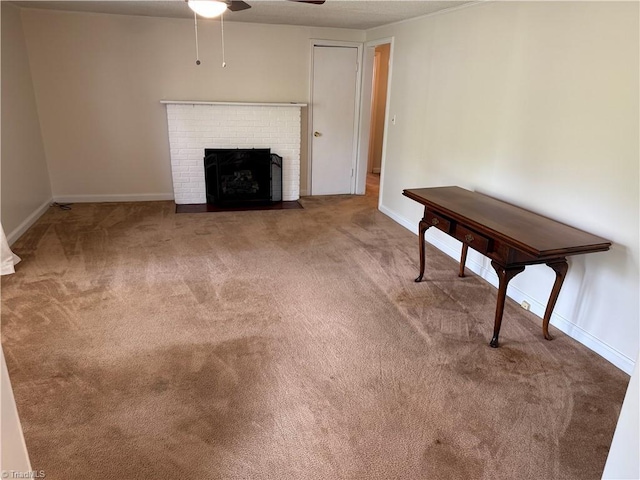 1632 Sanford Dr, Winston-Salem, NC 27105 - unfurnished living room with a brick fireplace, a ceiling fan, and carpet