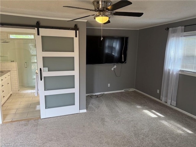 1632 Sanford Dr, Winston-Salem, NC 27105 - interior space with a textured ceiling, light colored carpet, a ceiling fan, and a barn door