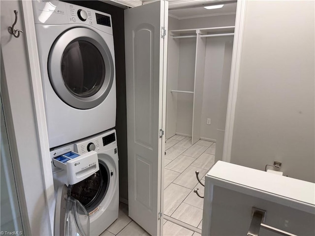 1632 Sanford Dr, Winston-Salem, NC 27105 - washroom with laundry area, stacked washer and clothes dryer, and ornamental molding
