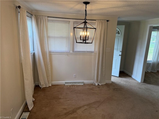 1632 Sanford Dr, Winston-Salem, NC 27105 - unfurnished dining area with baseboards, visible vents, a notable chandelier, and carpet
