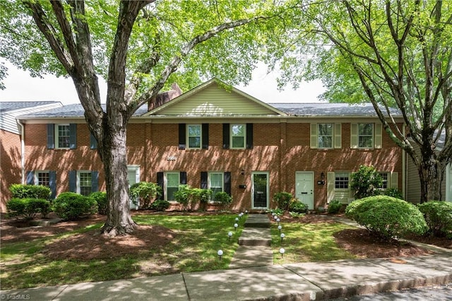 3950 Valley Ct Unit E, Winston-Salem, NC 27106 - colonial inspired home with brick siding and a front yard