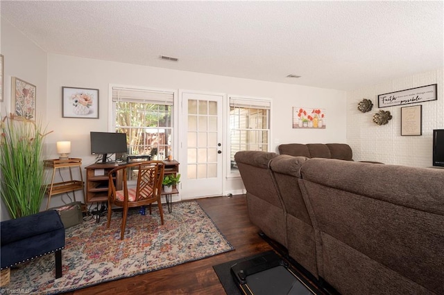 3950 Valley Ct Unit E, Winston-Salem, NC 27106 - living room featuring a textured ceiling, wood finished floors, and an office area