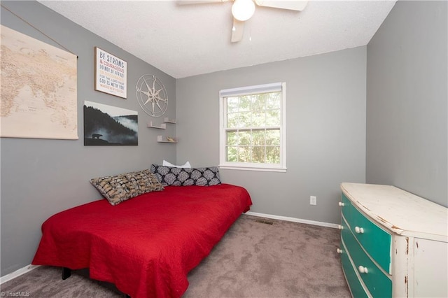 3950 Valley Ct Unit E, Winston-Salem, NC 27106 - carpeted bedroom with baseboards and ceiling fan