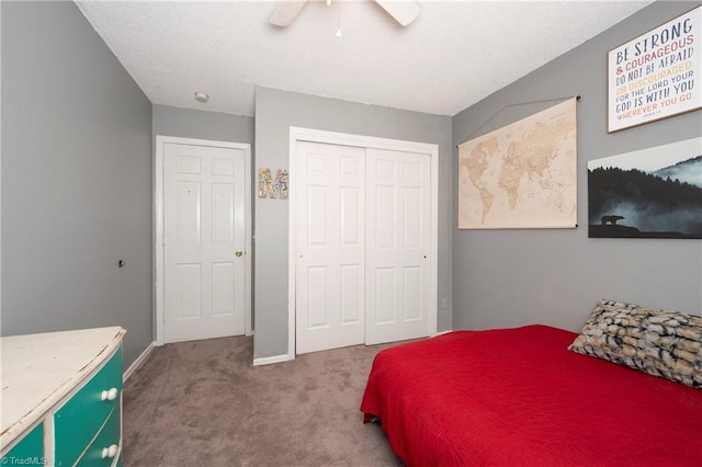 3950 Valley Ct Unit E, Winston-Salem, NC 27106 - carpeted bedroom with a closet, a ceiling fan, and baseboards