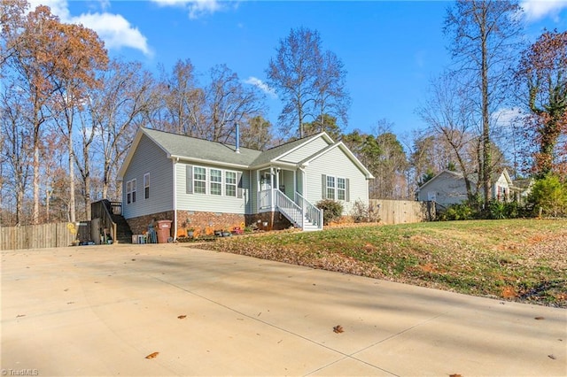 view of front of home with a front lawn