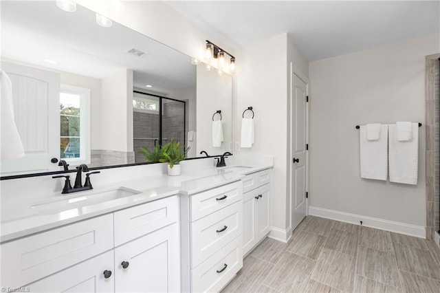 bathroom featuring vanity and walk in shower