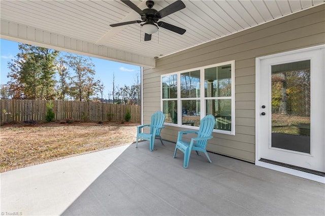 view of patio featuring ceiling fan