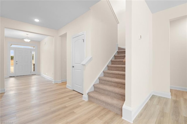 entrance foyer with light hardwood / wood-style flooring