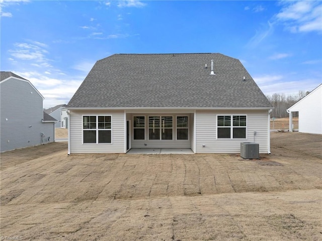 back of property featuring central AC and a patio area