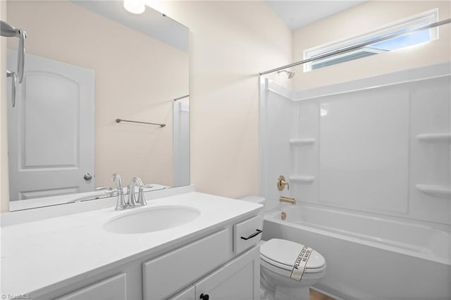 full bathroom with vanity,  shower combination, and toilet