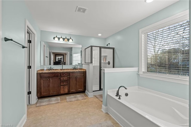 bathroom with vanity and plus walk in shower