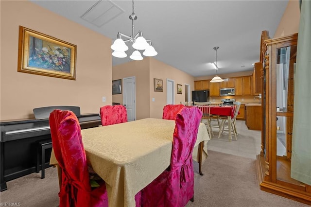 2503 Macdougall Dr, Burlington, NC 27217 - dining space with a chandelier, visible vents, and light carpet