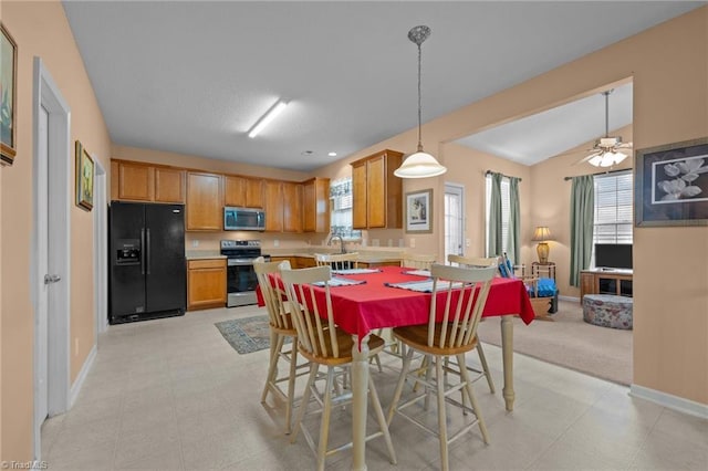 2503 Macdougall Dr, Burlington, NC 27217 - dining room with light floors, ceiling fan, and baseboards