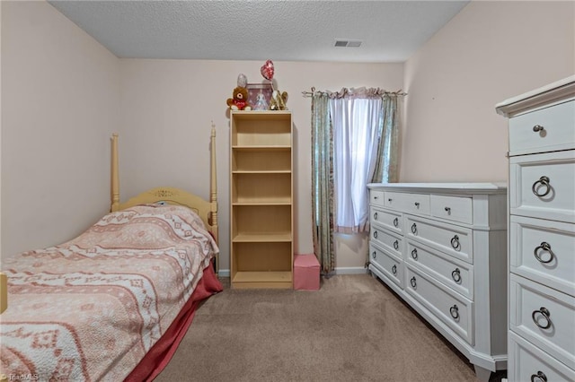 2503 Macdougall Dr, Burlington, NC 27217 - bedroom with visible vents, carpet floors, and a textured ceiling