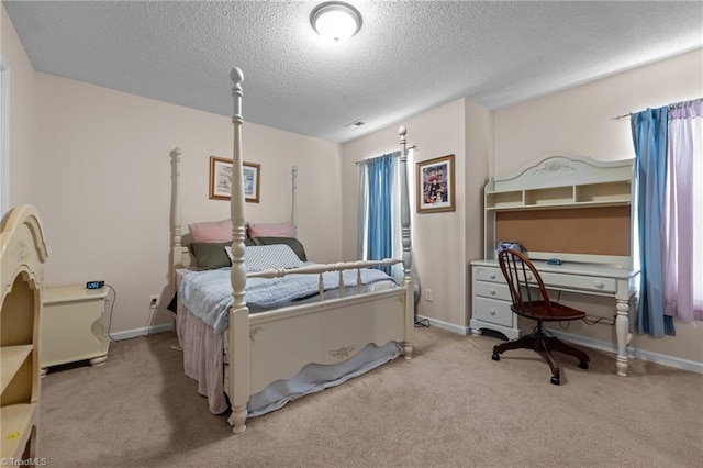2503 Macdougall Dr, Burlington, NC 27217 - bedroom with baseboards, light carpet, and a textured ceiling