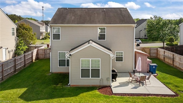 2503 Macdougall Dr, Burlington, NC 27217 - back of house with a lawn, a fenced backyard, and a patio area