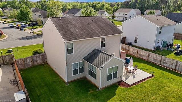 2503 Macdougall Dr, Burlington, NC 27217 - back of property with a residential view, a patio, and a lawn