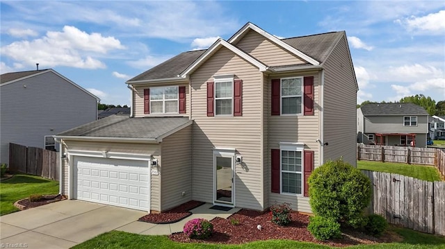 2503 Macdougall Dr, Burlington, NC 27217 - view of front facade featuring a garage, fence, a shingled roof, and driveway