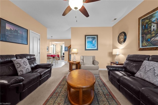 2503 Macdougall Dr, Burlington, NC 27217 - living area featuring ceiling fan, baseboards, visible vents, and carpet floors