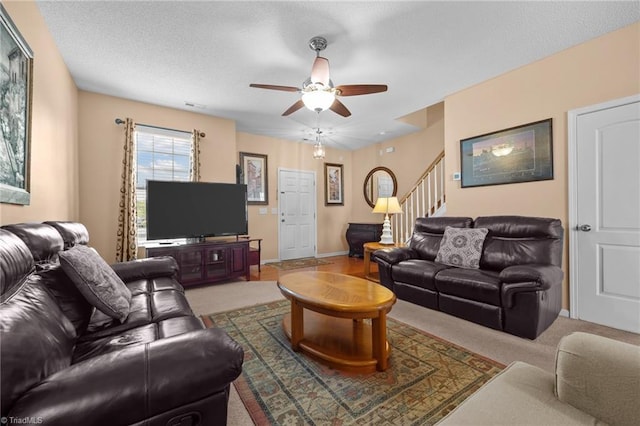 2503 Macdougall Dr, Burlington, NC 27217 - carpeted living area featuring ceiling fan, stairway, and baseboards