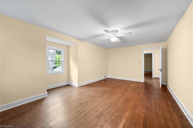 986 Avon Rd, Winston-Salem, NC 27104 - empty room with a ceiling fan, wood finished floors, and baseboards