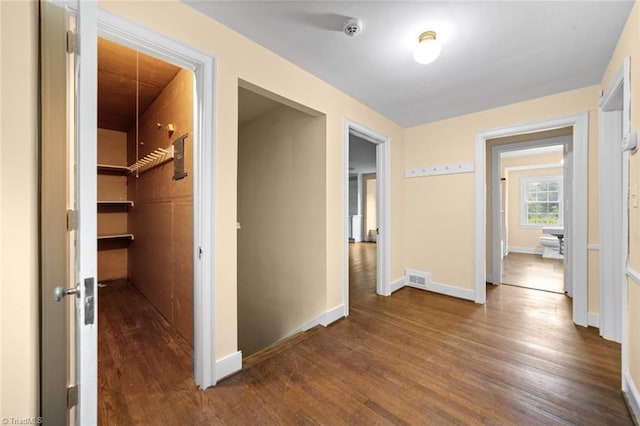 986 Avon Rd, Winston-Salem, NC 27104 - corridor featuring dark wood-type flooring and baseboards