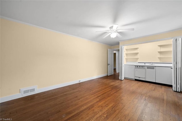 986 Avon Rd, Winston-Salem, NC 27104 - unfurnished living room featuring ceiling fan, dark wood finished floors, baseboards, a sink, and crown molding