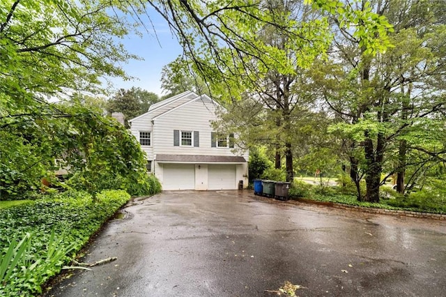 986 Avon Rd, Winston-Salem, NC 27104 - view of home's exterior featuring driveway and a garage