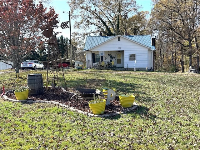 view of yard featuring covered porch