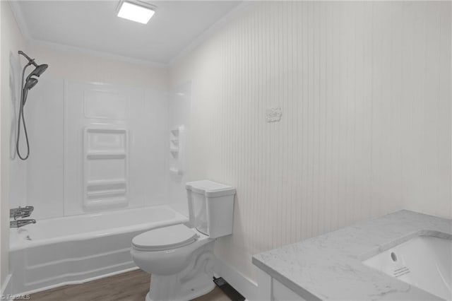 4221 Old Greensboro Rd, Winston-Salem, NC 27101 - bathroom with crown molding, toilet, wood finished floors, vanity, and washtub / shower combination