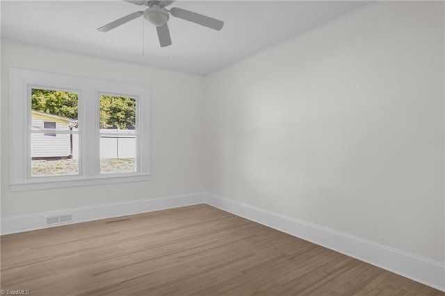 4221 Old Greensboro Rd, Winston-Salem, NC 27101 - spare room featuring light wood-type flooring, baseboards, and ceiling fan