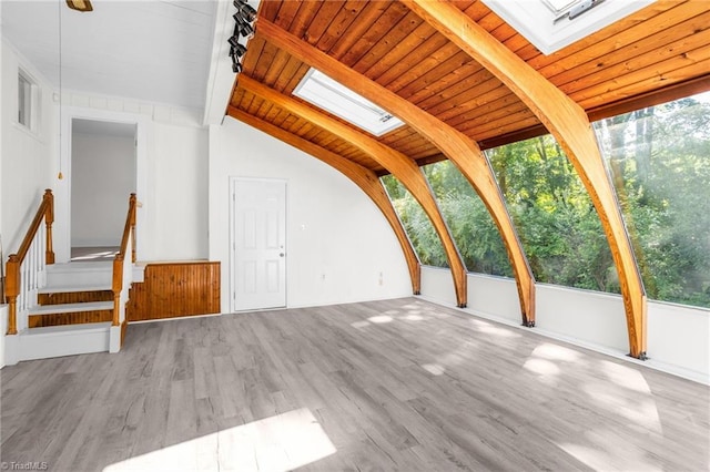 4221 Old Greensboro Rd, Winston-Salem, NC 27101 - unfurnished living room with a skylight, wood finished floors, and wood ceiling