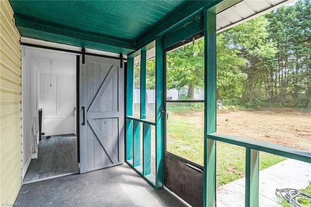 4221 Old Greensboro Rd, Winston-Salem, NC 27101 - unfurnished sunroom with a barn door