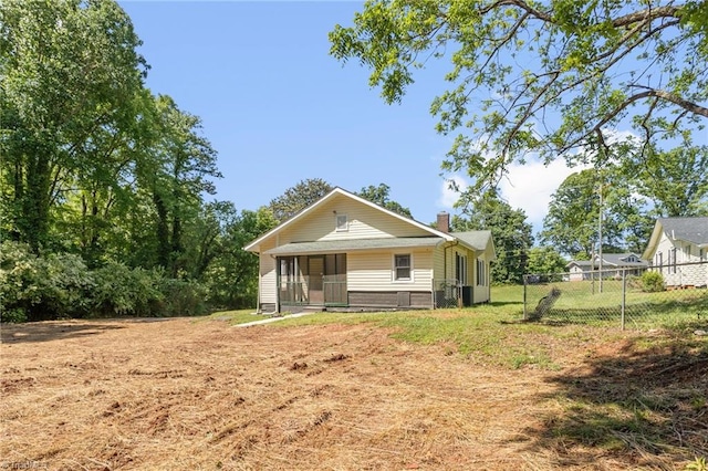 4221 Old Greensboro Rd, Winston-Salem, NC 27101 - view of front of home featuring a chimney and fence
