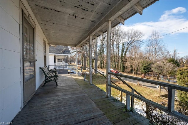 deck with covered porch