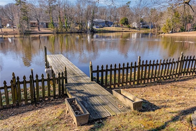 view of dock with a water view