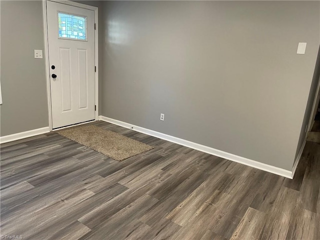 foyer entrance featuring dark hardwood / wood-style floors