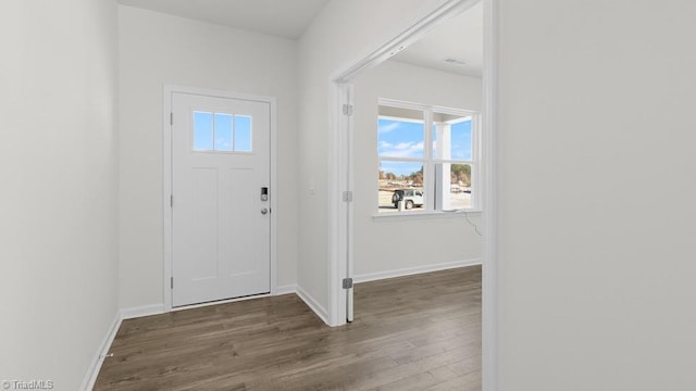 6601 Grogan Hill Rd, Whitsett, NC 27377 - entrance foyer with wood finished floors and healthy amount of natural light
