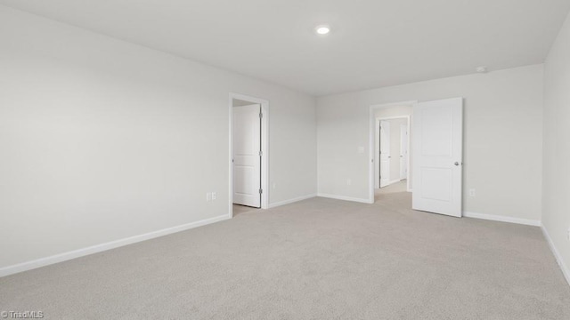 6601 Grogan Hill Rd, Whitsett, NC 27377 - unfurnished bedroom with carpet and recessed lighting