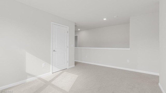 6601 Grogan Hill Rd, Whitsett, NC 27377 - empty room featuring carpet floors and recessed lighting