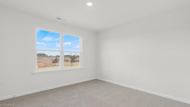 6601 Grogan Hill Rd, Whitsett, NC 27377 - spare room with carpet flooring and recessed lighting