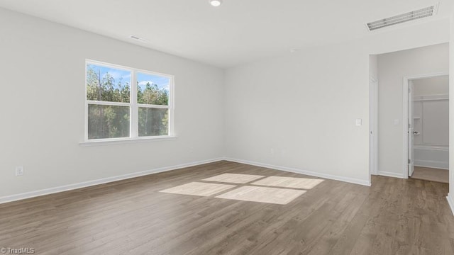 6601 Grogan Hill Rd, Whitsett, NC 27377 - unfurnished room featuring wood finished floors